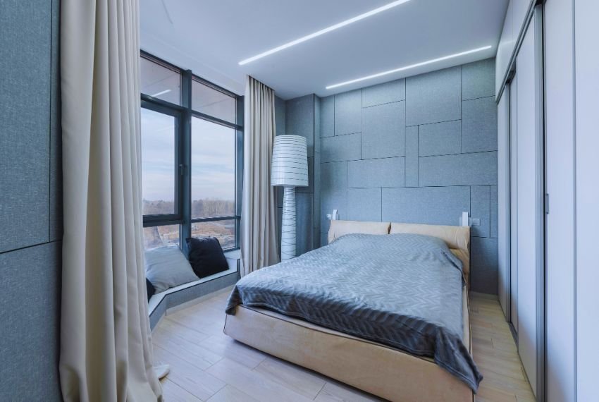Bedroom photo of studio apartment with Side Window view