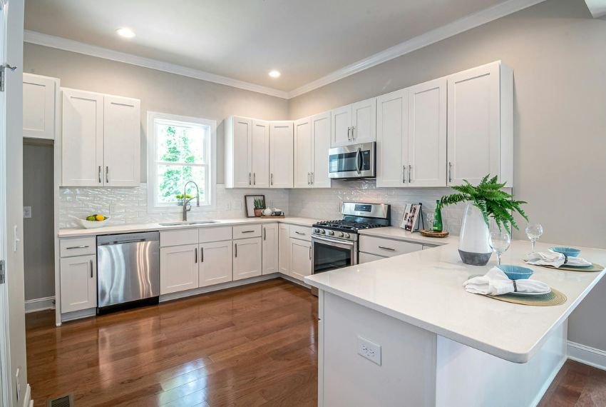 Hardwood Floor in Kitchen with White Cabinets