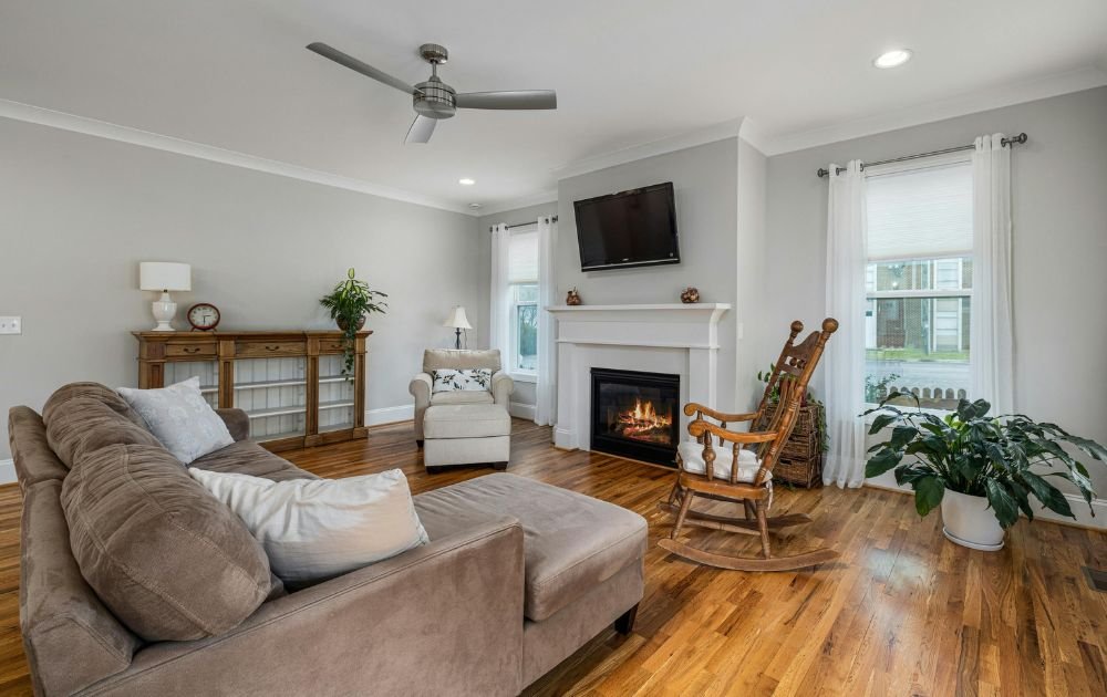 Living Room With Fireplace wall with TV