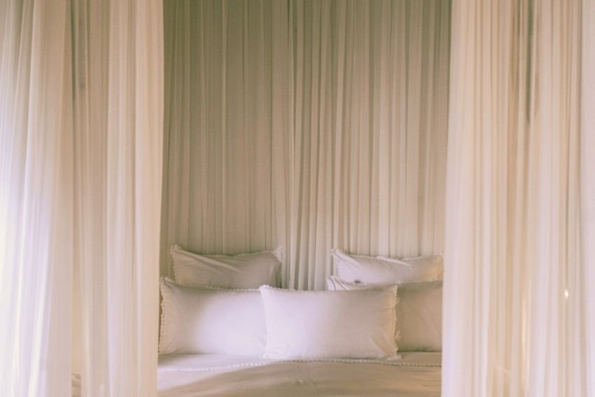 Sheer Canopy Bed with warms lights