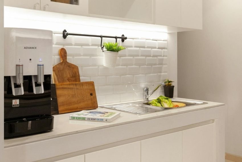 Kitchen shelf with with white accent backsplash