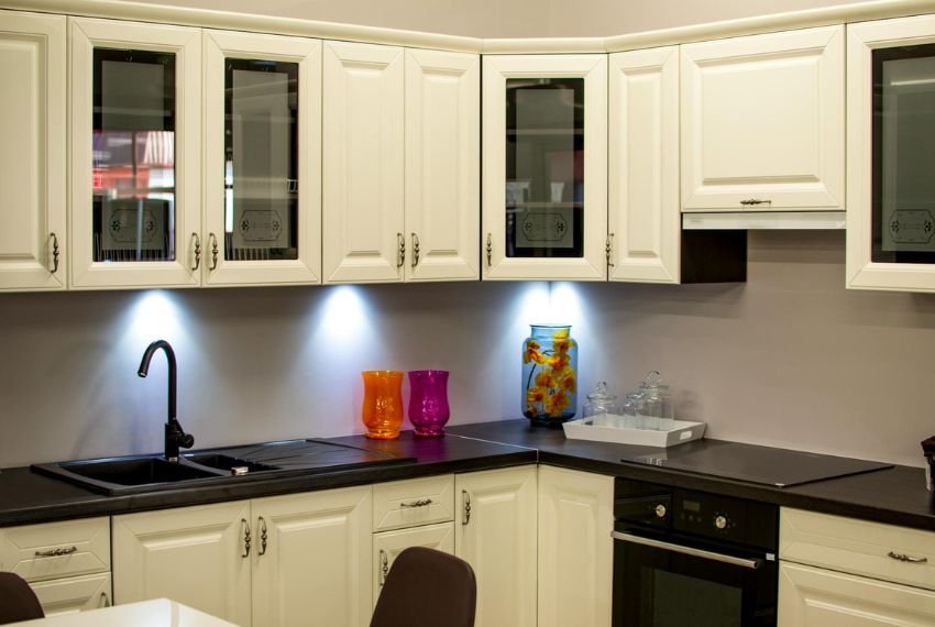 white kitchen cabinets with glass door