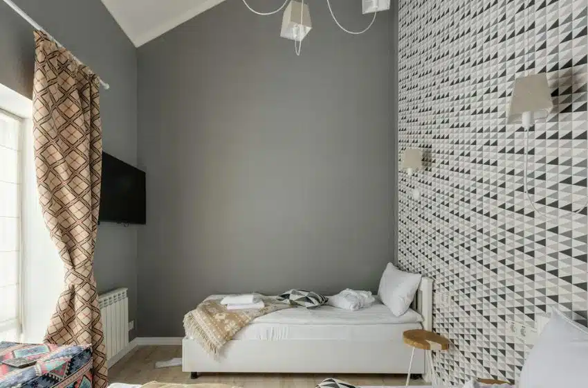 small bedroom with corner bed 