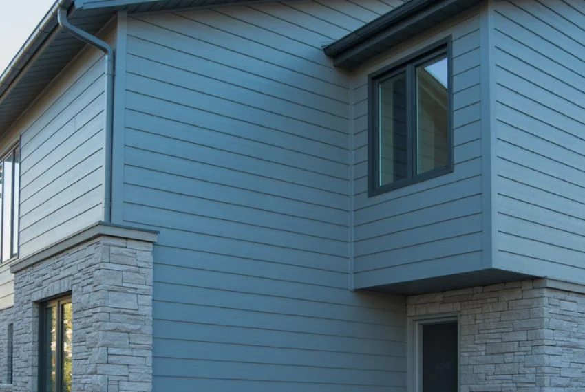 Material Choices That Enhance Light Blue Exteriors