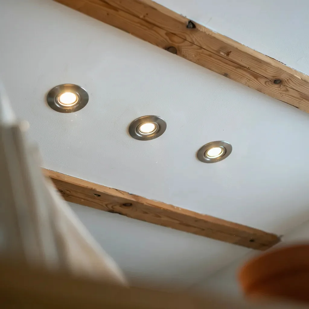 Recessed Lighting Creates A Streamlined Look On Angled Ceilings