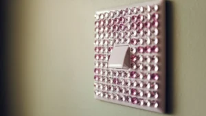 Bedazzled Light Switch Covers Turn Boring Walls Into Art