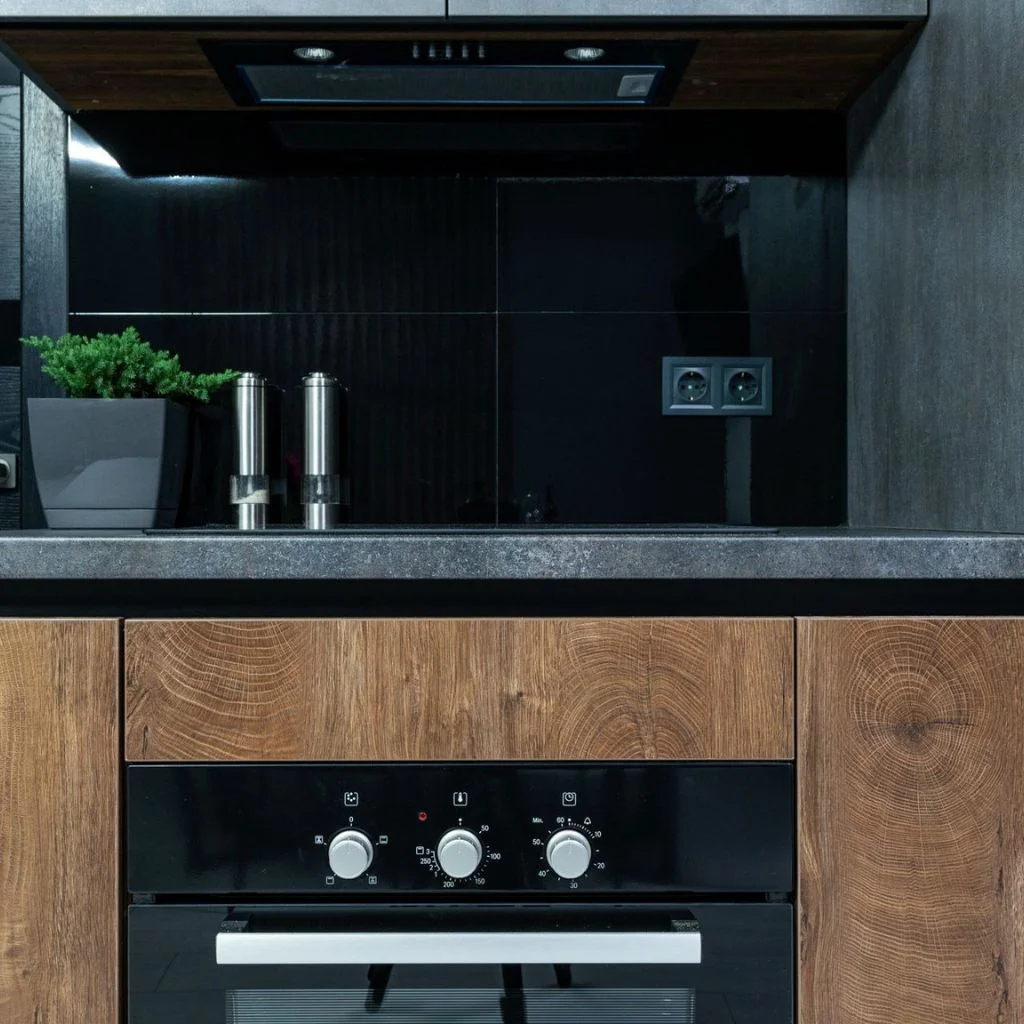 Organic Wood Grain Paired With Matte Black Finishes