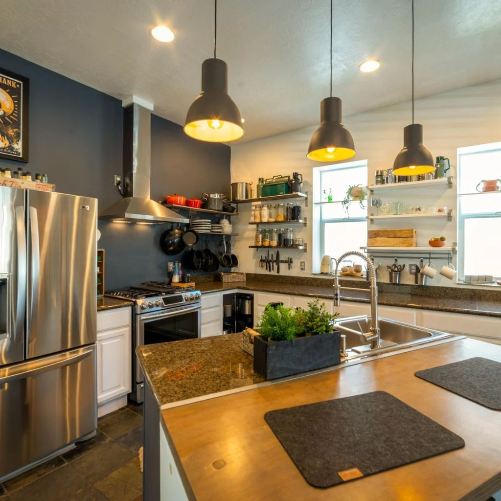 Layered Lighting Turns the Island Into a Cosy Focal Point