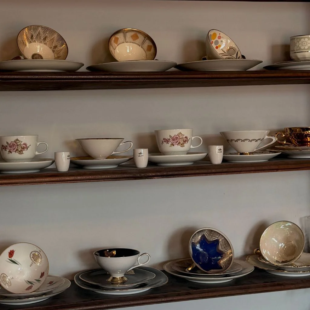grouped teacups shelf