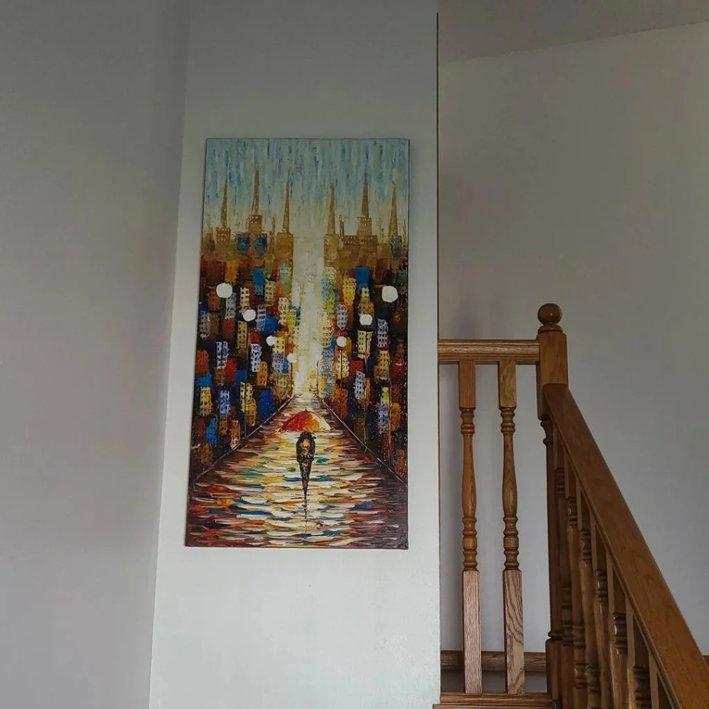 Oversized Art Reduces Visual Clutter On Tall Walls