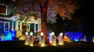 Spray Painted Chicken Wire Ghosts Glow Eerily After Dark