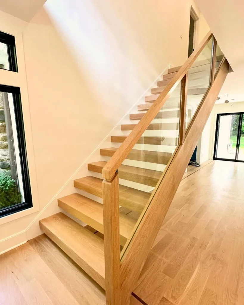 Farmhouse Staircases Get a Modern Glass Update