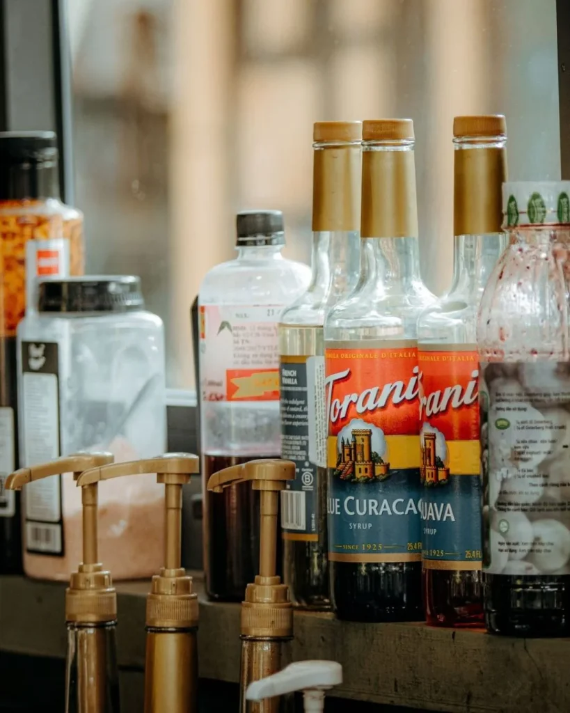 glass shelves window kitchen bottles
