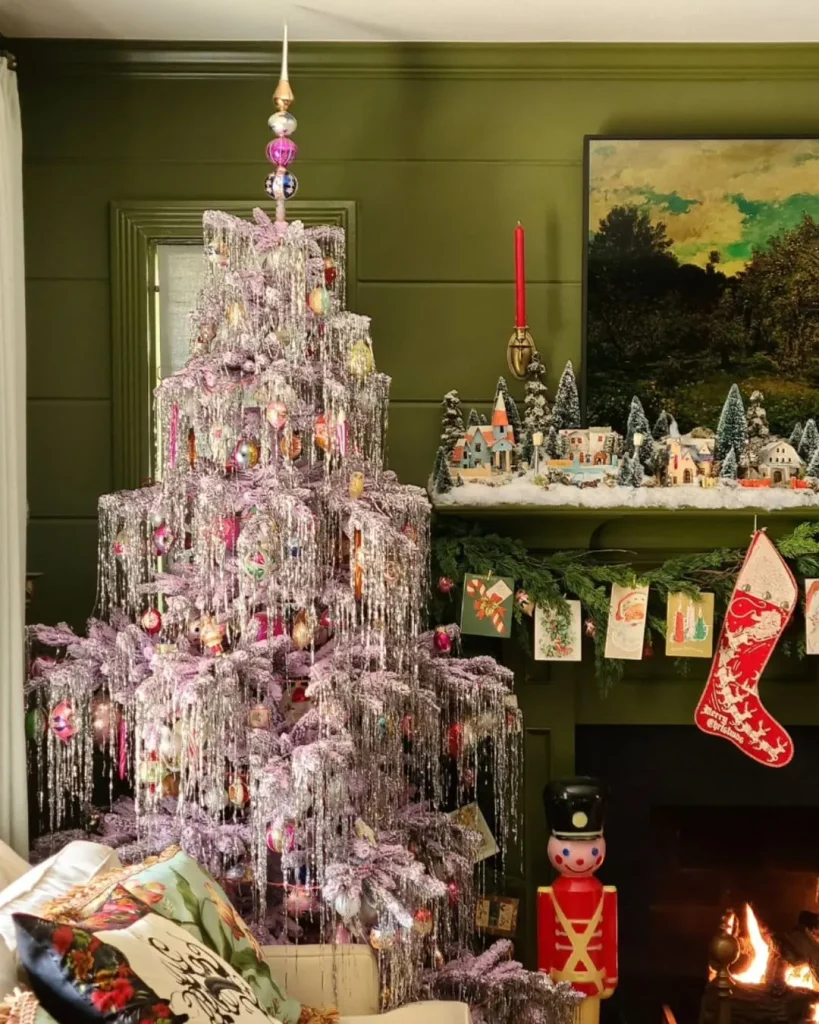 Flocked tree with vintage glass baubles and silver tinsel swags