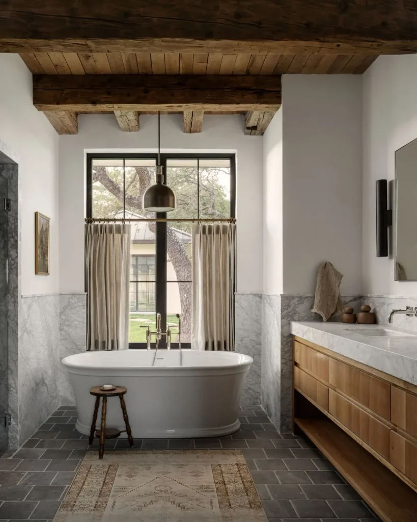 Rustic bathroom with exposed timber ceiling beams