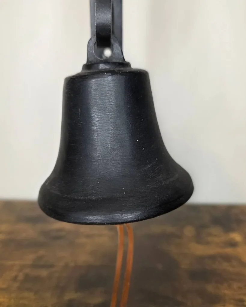 antique iron bells