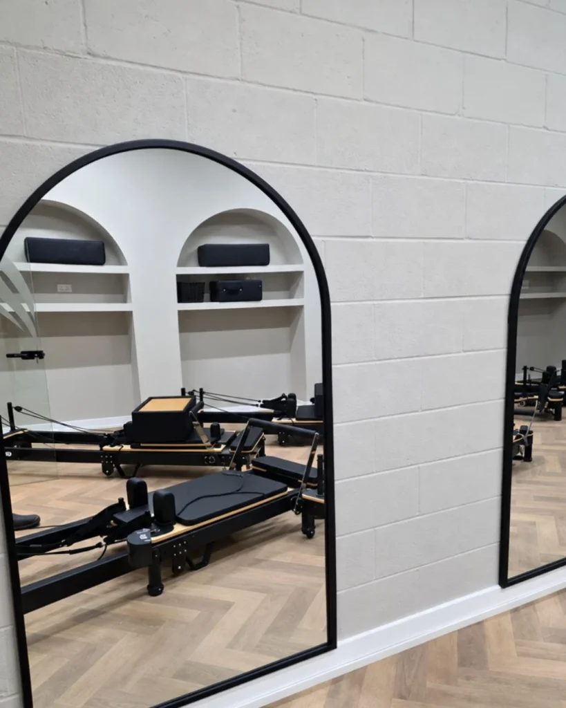 arched mirror yoga room