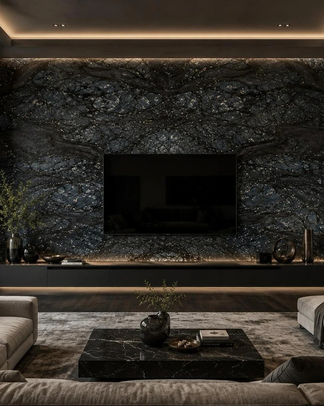 Floor-to-ceiling dark veined marble wall with a mounted television and warm LED underlighting