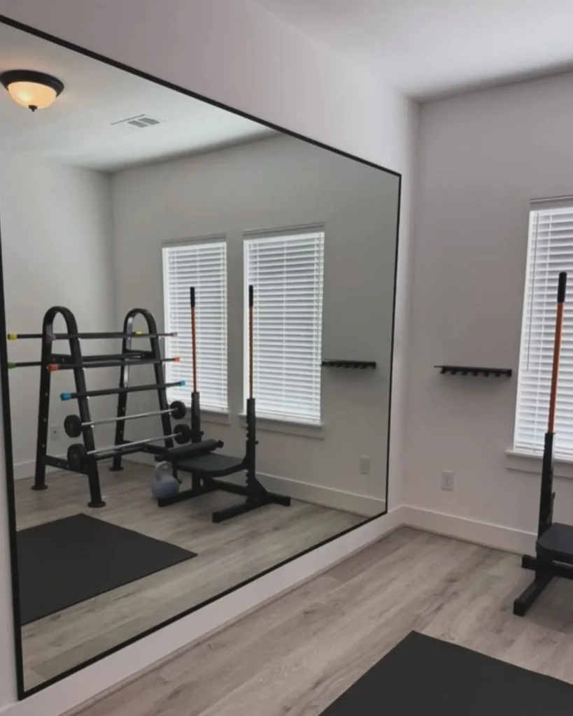 basement gym window light mirror