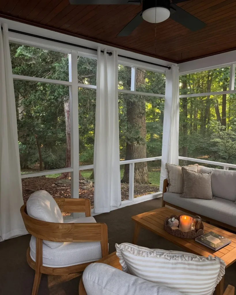 screened porch fitted with clear panels framed