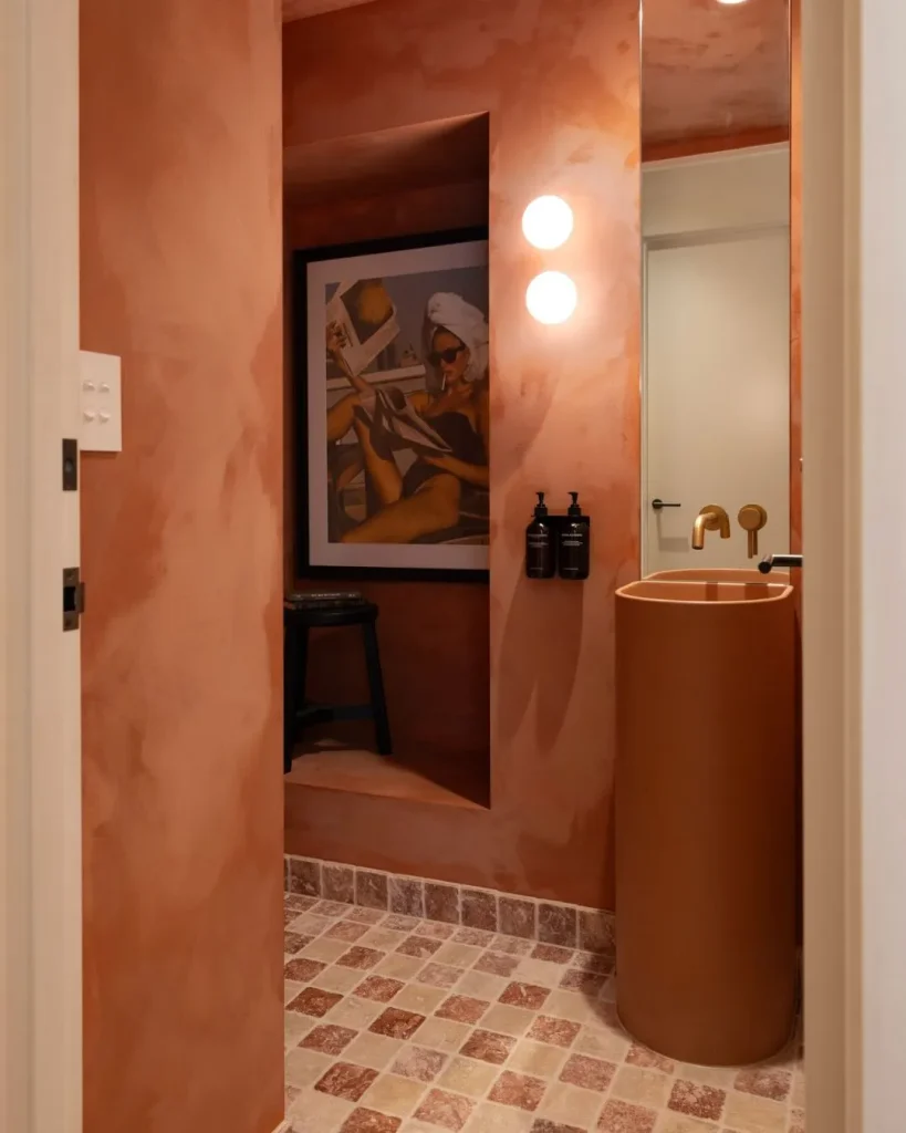 small powder room terracotta walls